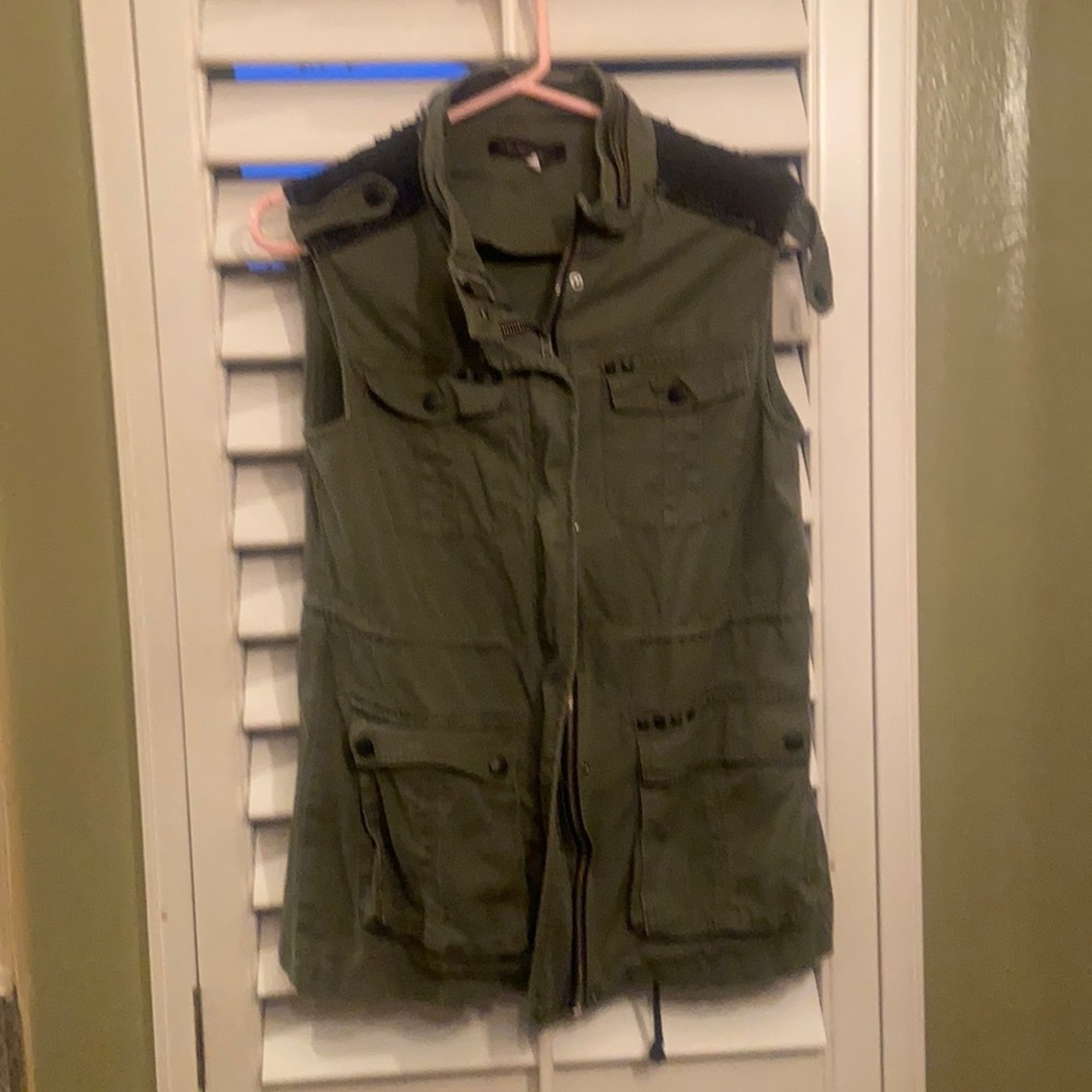 Distressed green military vest
